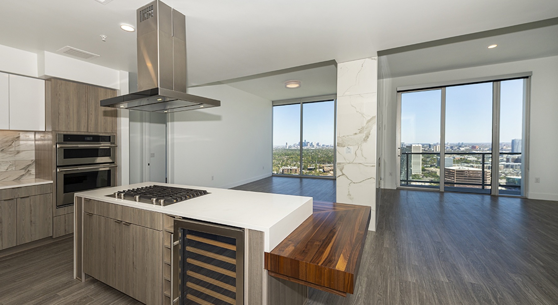 open living concepts include kitchen areas that blend with the living room