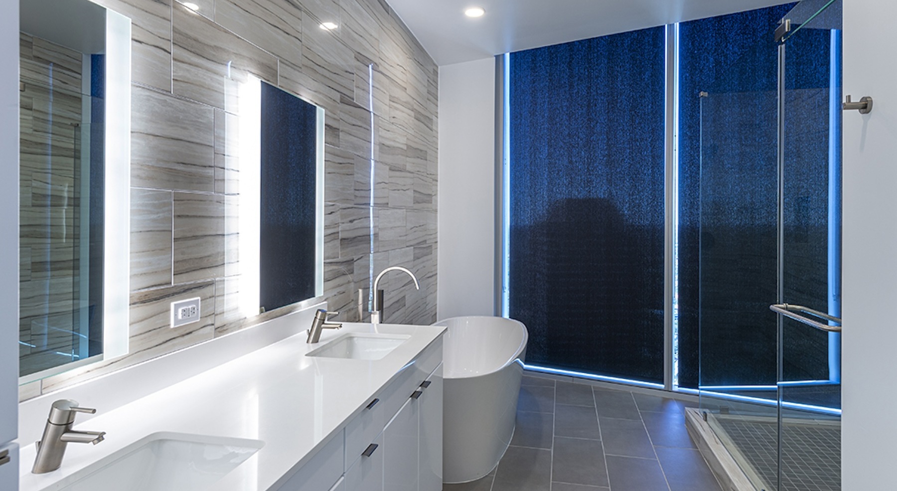 bath area by night showing evening community views